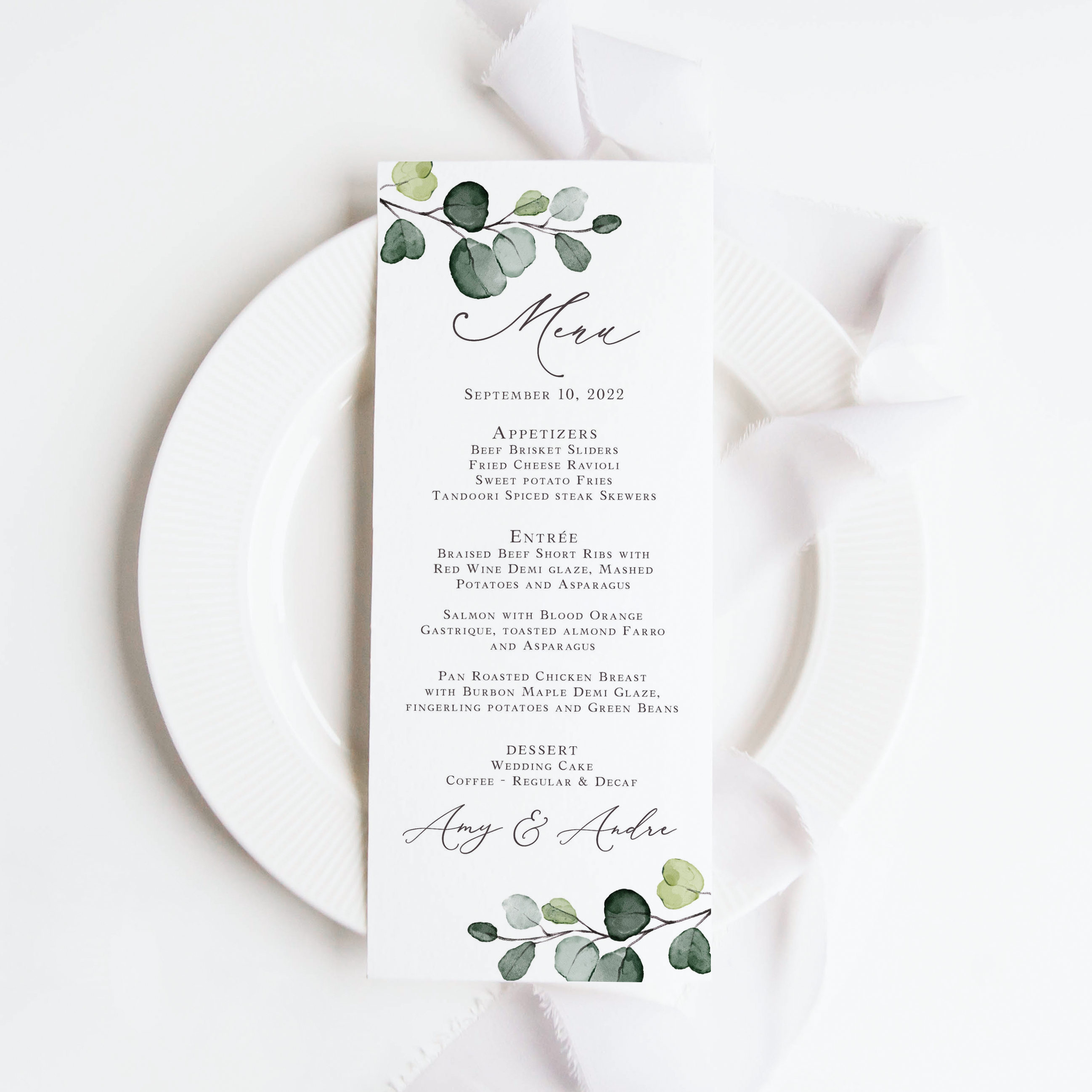 Printed eucalyptus wedding menu cards that are personalized for you.