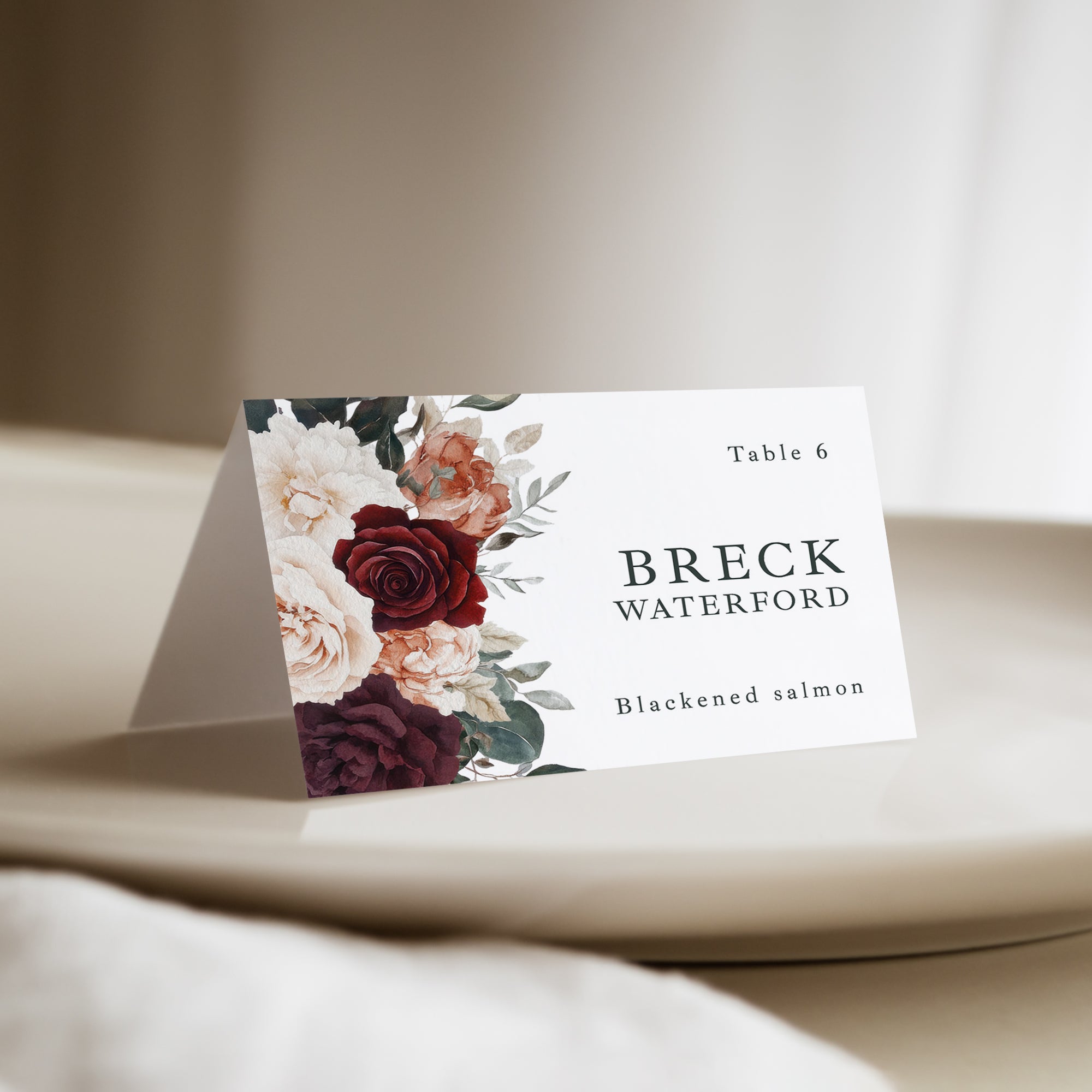 Bring a touch of natural beauty to your wedding with our personalized burgundy floral place cards with meal choice. Not only do they guide your guests to their seats, but they also add a romantic, floral touch to your wedding reception décor.