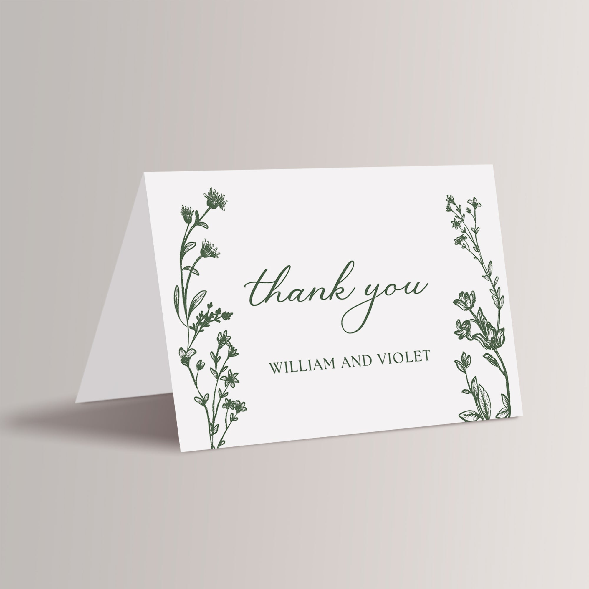 Personalized wedding thank you cards with gorgeous dark green florals – a perfect way to express your gratitude for your wedding.