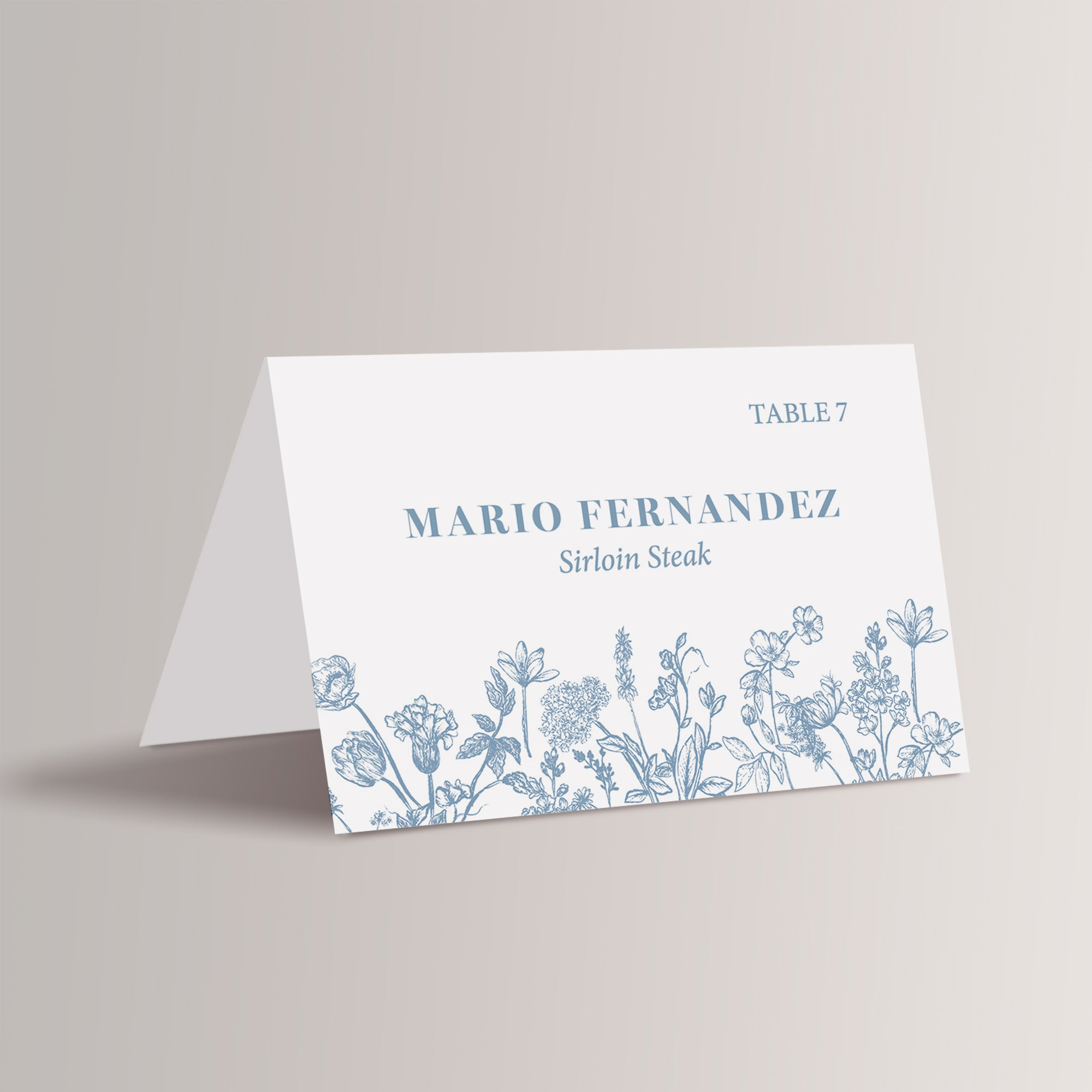 Bring a touch of natural beauty to your wedding with our personalized dusty blue French toile floral place cards with meal choice. Not only do they guide your guests to their seats, but they also add a romantic, floral touch to your wedding reception décor.