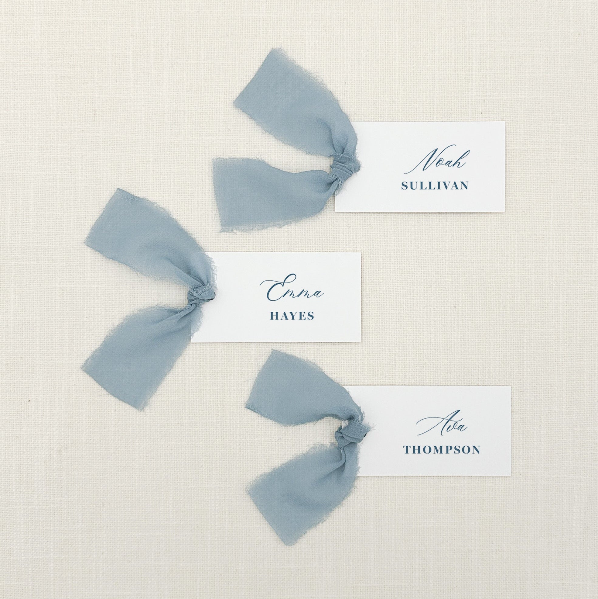 Personalized Place Cards with Dusty Blue Chiffon Ribbon in blue ink that are printed for you on thick, smooth, white card stock! Perfect for any occasion: Weddings and Rehearsal Dinners, Baby Shower, Bridal Shower, Wedding Shower, Business Party, Corporate Event or Events with assigned seating.