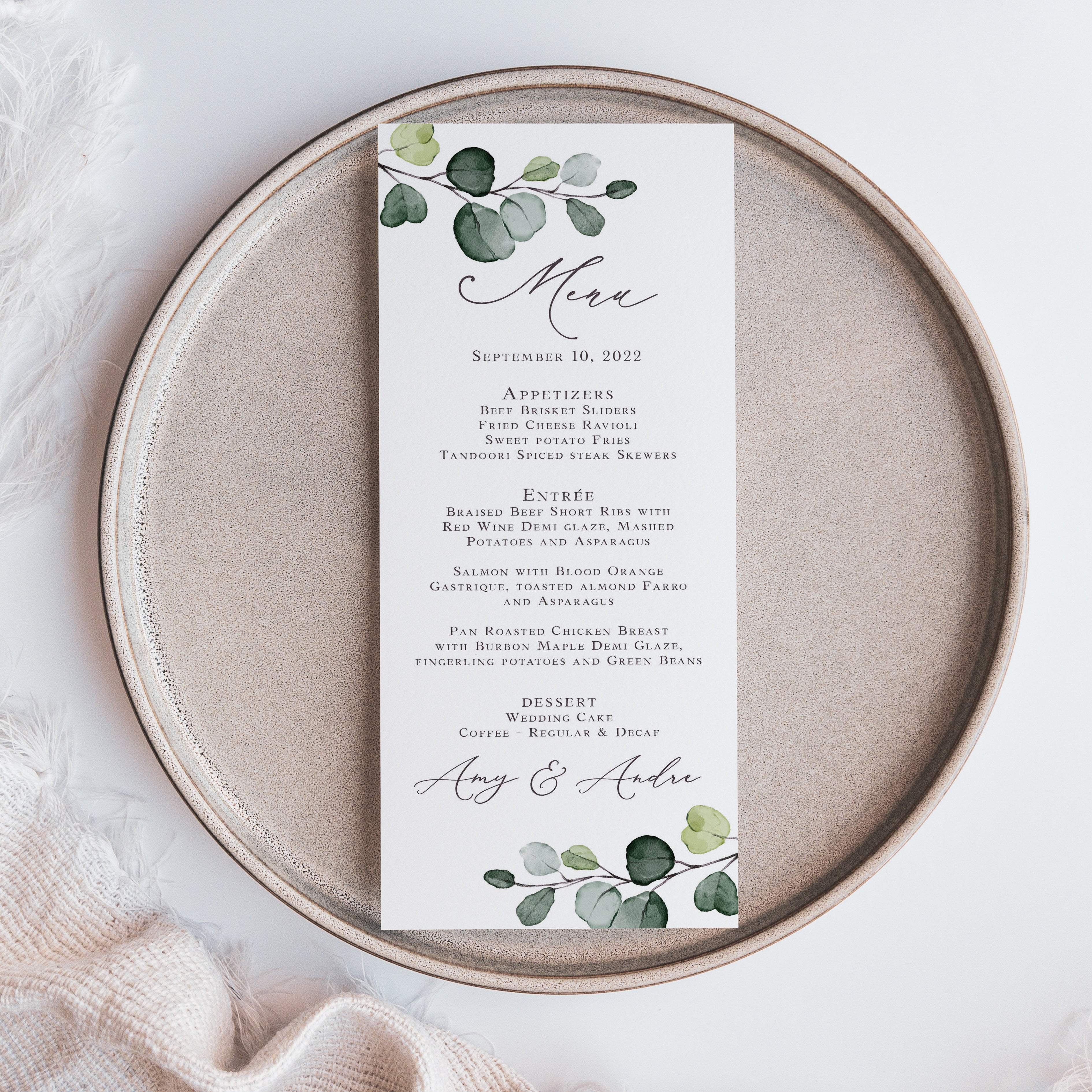 Printed eucalyptus wedding menu cards that are personalized for you.