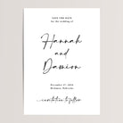 Black and white save the date. At the top reads "Save the Date for the wedding of" In a small serif font. The center reads "Hannah and Damion" in a large script font. Below the names reads "December 27, 2028. Hickman, Nebraska." Near the bottom, a line "invitation to follow" also in a script font.