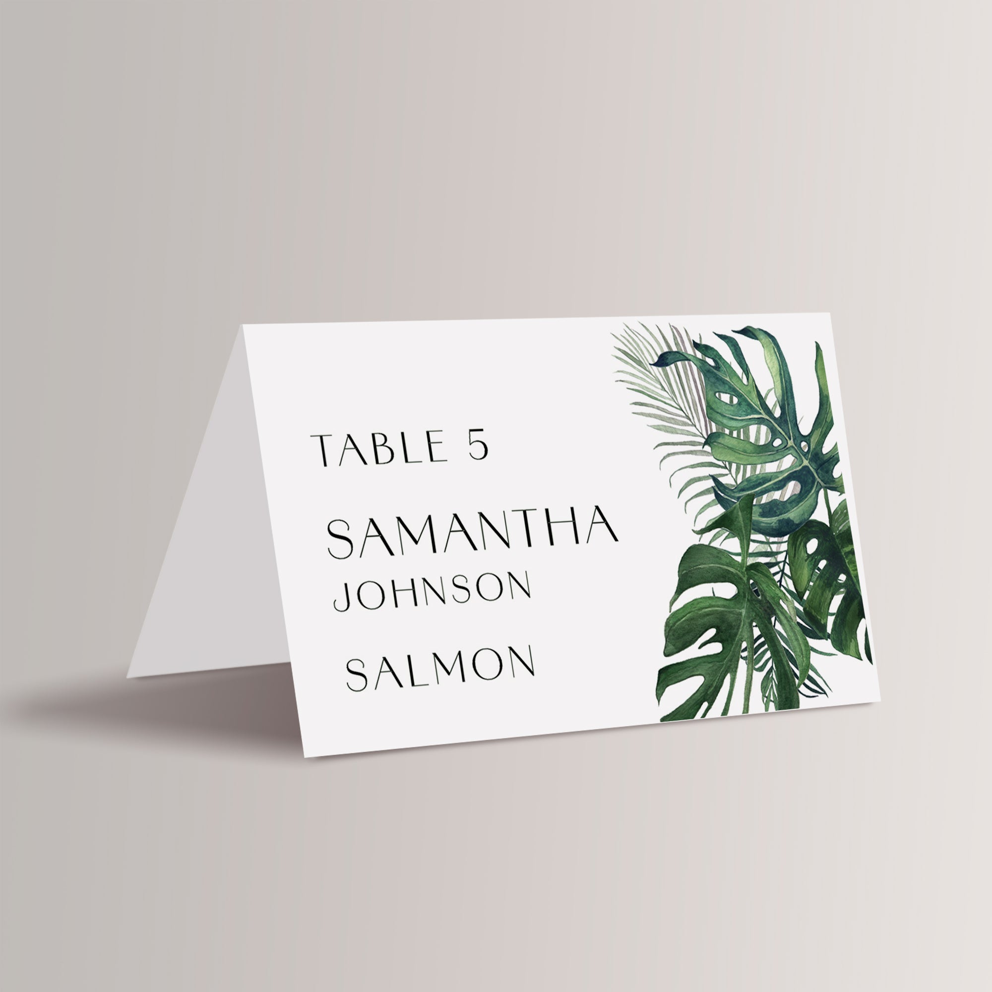 Bring a touch of paradise to your destination wedding in Hawaii, Jamaica, Mexico, or the Virgin Islands with our personalized tropical place cards. Featuring lush palm leaves and a modern serif font, these elegant name cards perfectly complement a beach or island-inspired wedding. Not only do they guide your guests to their seats, but they also add a stylish, tropical flair to your wedding reception décor.