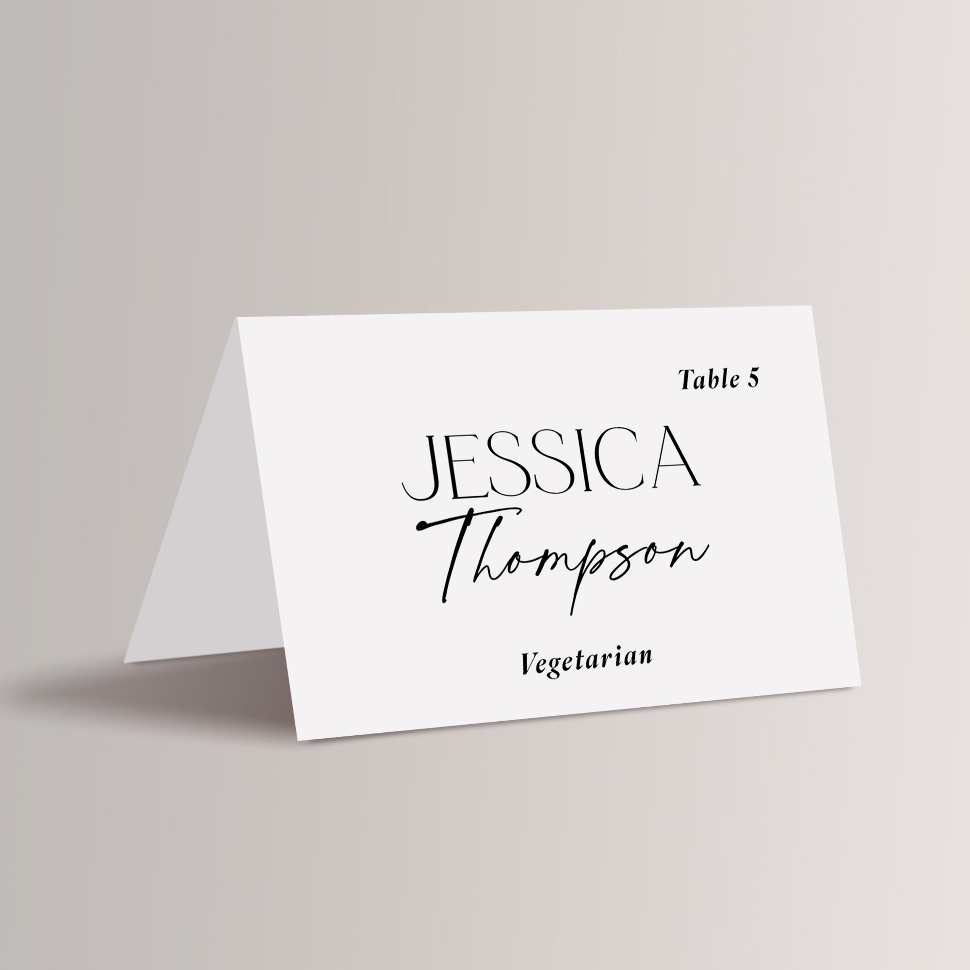 Add a touch of elegance to your wedding reception or event with these personalized, minimalist place cards. Featuring a classy black-and-white design with a beautiful mix of script and serif fonts, these place cards not only guide your guests to their seats but also serve as meal indicators to ensure each guest is served their preferred meal. Perfect for modern, chic celebrations.