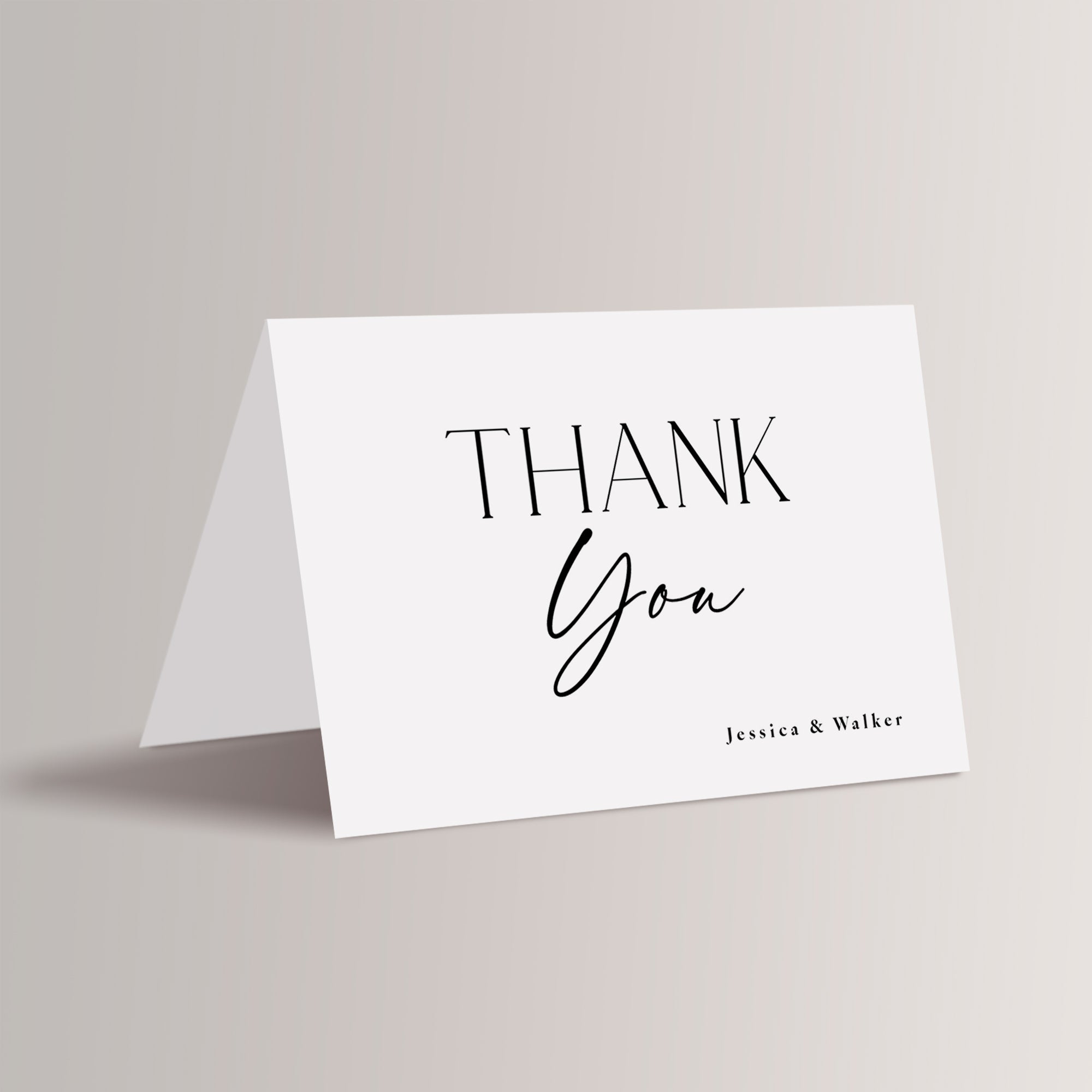 Express your gratitude with timeless elegance using these black-and-white wedding thank you cards. Designed with sleek lines and a refined blend of script and serif fonts, these minimalist cards perfectly complement your modern wedding. Personalize with your names for a thoughtful and stylish touch that reflects the beauty of your celebration.
