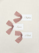 Personalized Shower Name Cards with Chiffon Ribbon that are printed for you with gold ink on thick, smooth, white card stock and include the ribbon! You can choose the color of ribbon. Perfect for any occasion:

Weddings and Rehearsal Dinners, Baby Shower, Bridal Shower, Wedding Shower, Business Party, Corporate Event or Events with assigned seating