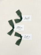 Personalized Wedding Place Cards with Chiffon Ribbon that are printed for you with black ink on thick, smooth, white card stock and include the ribbon! You can choose the color of ribbon. Perfect for any occasion:

Weddings and Rehearsal Dinners
Baby Shower, Bridal Shower, Wedding Shower
Business Party, Corporate Event
Events with assigned seating