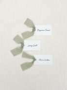 Personalized Name Cards with Green Chiffon Ribbon that are printed for you with black ink on thick, smooth, white card stock and include the ribbon! You can choose the color of ribbon. Perfect for any occasion: Weddings and Rehearsal Dinners, Baby Shower, Bridal Shower, Wedding Shower, Business Party, Corporate Event or Events with Assigned Seating