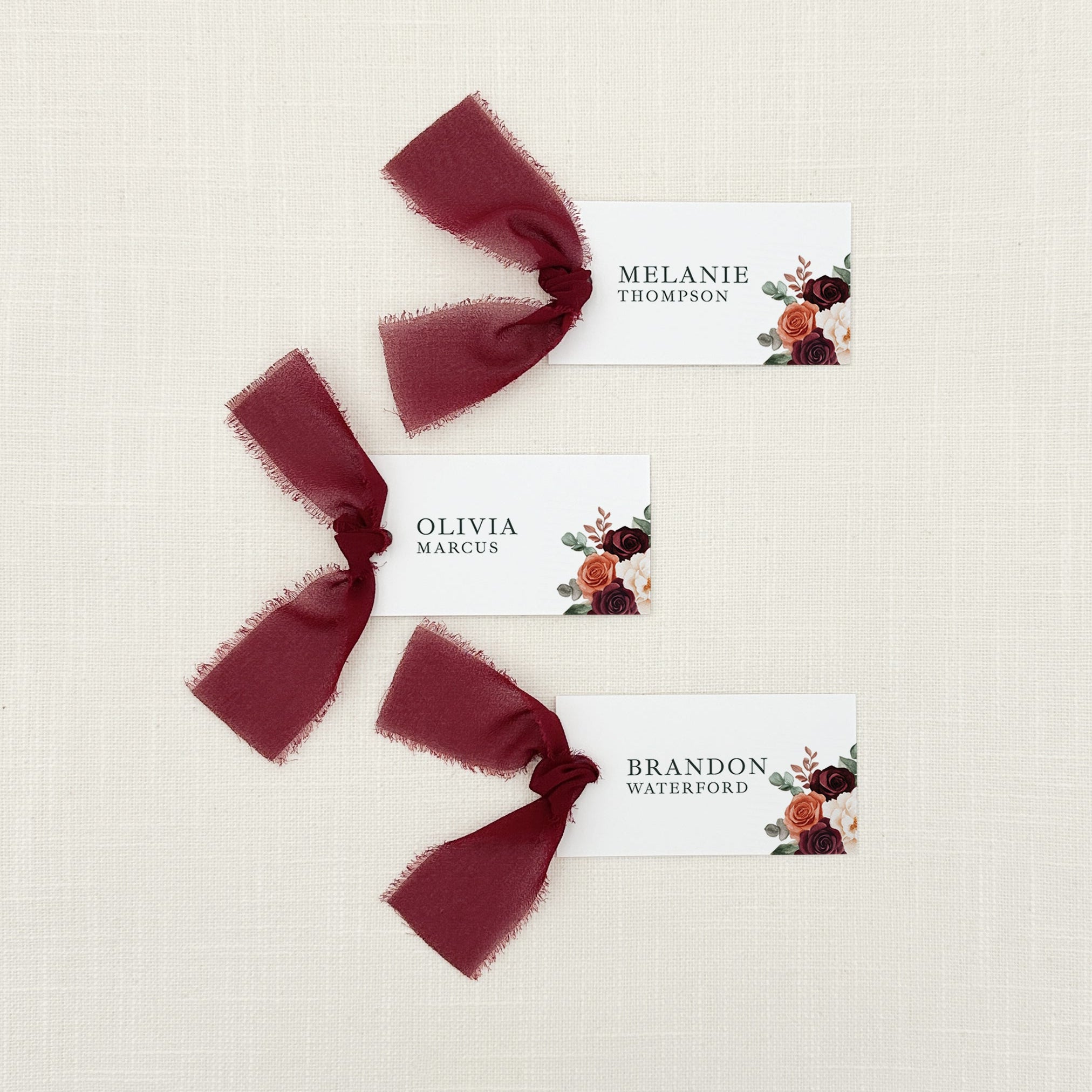 Personalized Name Cards with Burgundy Chiffon Ribbon that are printed for you with black ink on thick, smooth, white card stock and include the ribbon! You can choose the color of ribbon. Perfect for any occasion: Weddings and Rehearsal Dinners, Baby Shower, Bridal Shower, Wedding Shower, Business Party, Corporate Event or Events with Assigned Seating