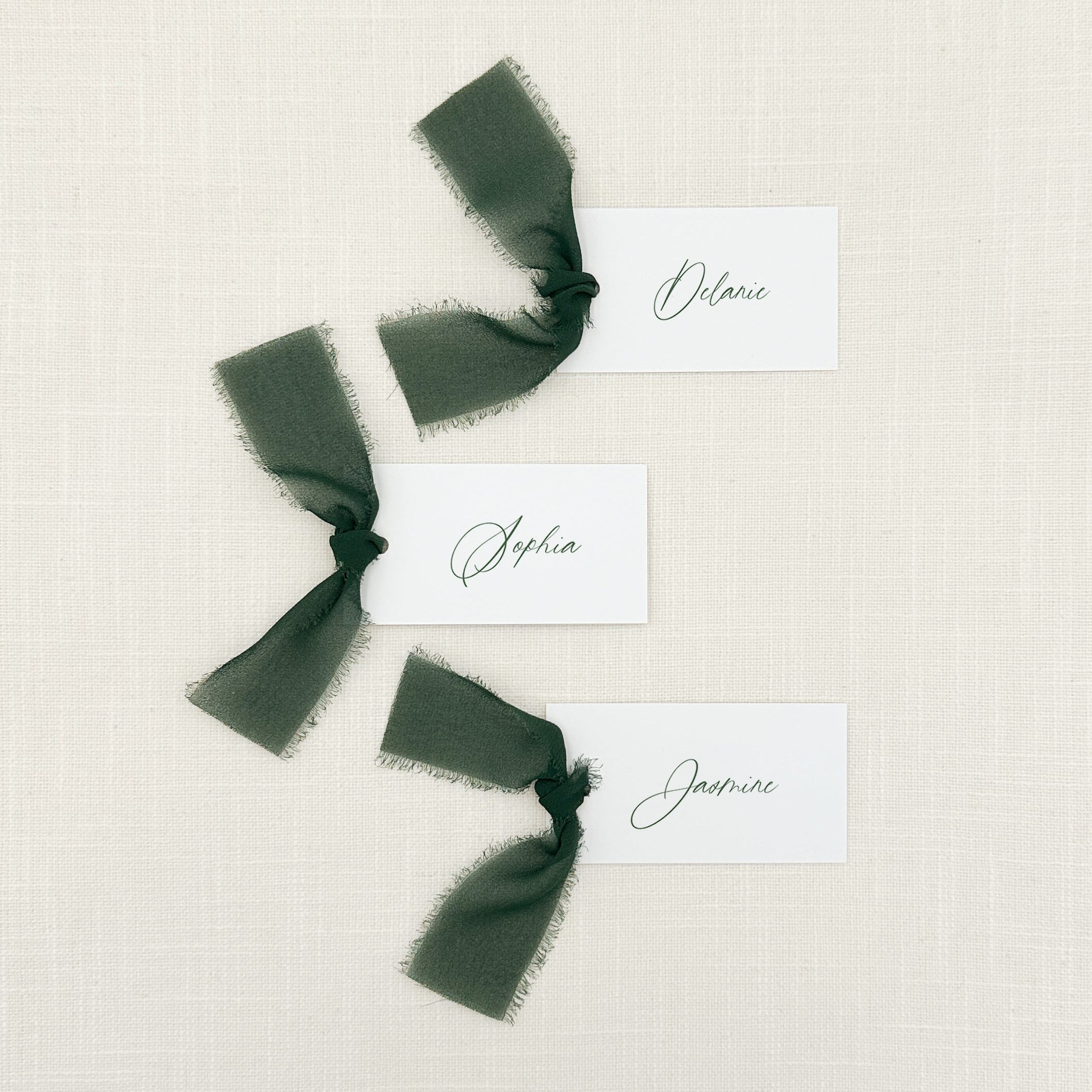 Personalized Place Cards with Dark Green Chiffon Ribbon in dark green ink that are printed for you on thick, smooth, white card stock! Perfect for any occasion: Weddings and Rehearsal Dinners, Baby Shower, Bridal Shower, Wedding Shower, Business Party, Corporate Event or Events with Assigned Seating