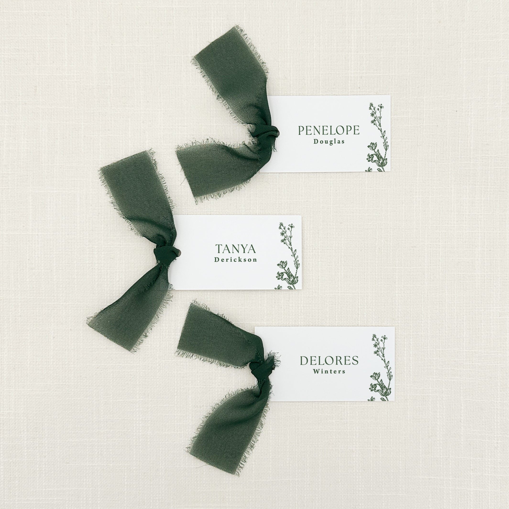 Personalized Place Cards with Dark Green Florals and Chiffon Ribbon in dark green ink that are printed for you on thick, smooth, white card stock! Perfect for any occasion: Weddings and Rehearsal Dinners, Baby Shower, Bridal Shower, Wedding Shower, Business Party, Corporate Event and Events with assigned seating.