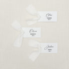 Personalized Name Cards with Table Numbers and Chiffon Ribbon that are printed for you in black ink on thick, smooth, white card stock! Perfect for any occasion: Weddings and Rehearsal Dinners, Baby Shower, Bridal Shower, Wedding Shower, Business Party, Corporate Event and Events with assigned seating.