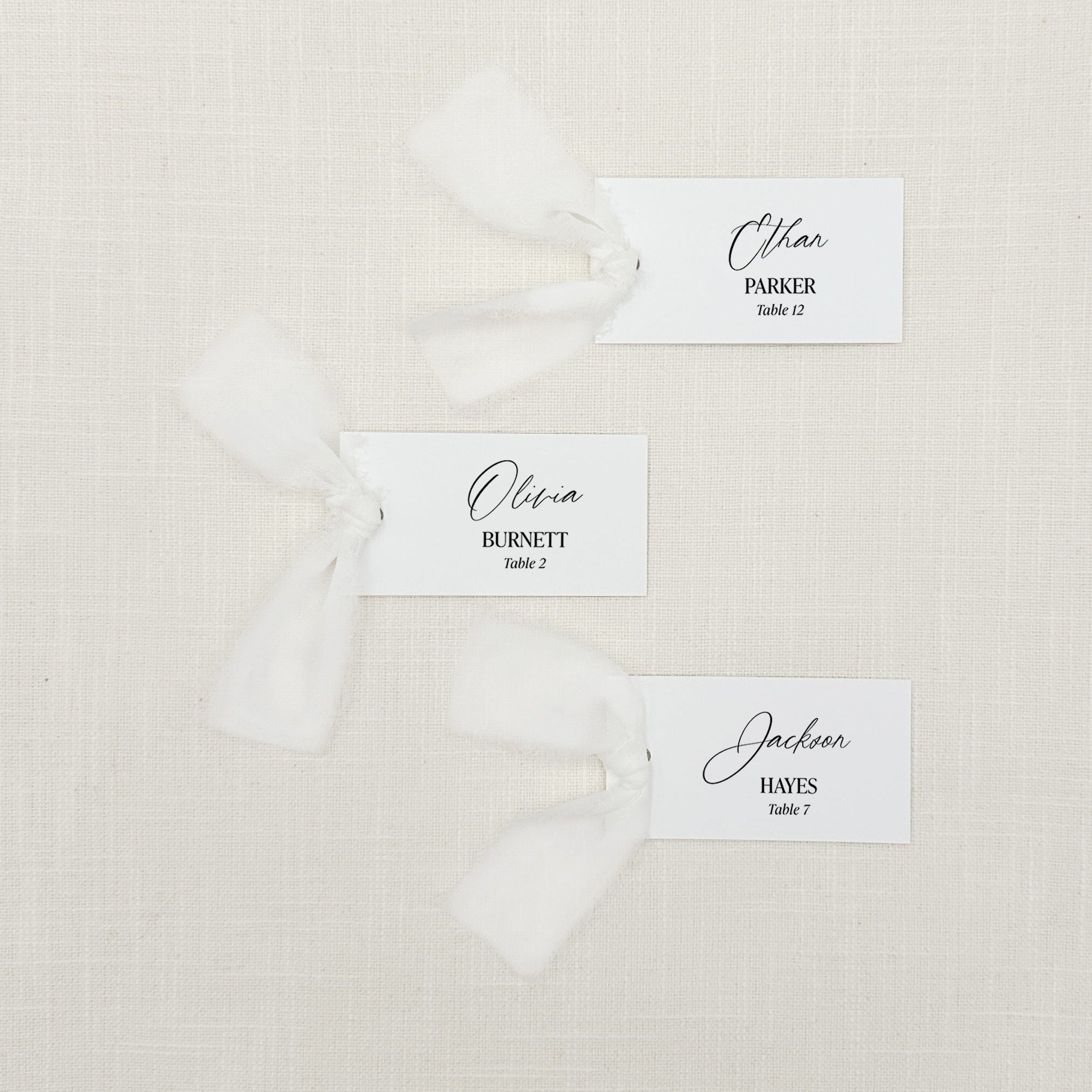 Personalized Name Cards with Table Numbers and Chiffon Ribbon that are printed for you in black ink on thick, smooth, white card stock! Perfect for any occasion: Weddings and Rehearsal Dinners, Baby Shower, Bridal Shower, Wedding Shower, Business Party, Corporate Event and Events with assigned seating.