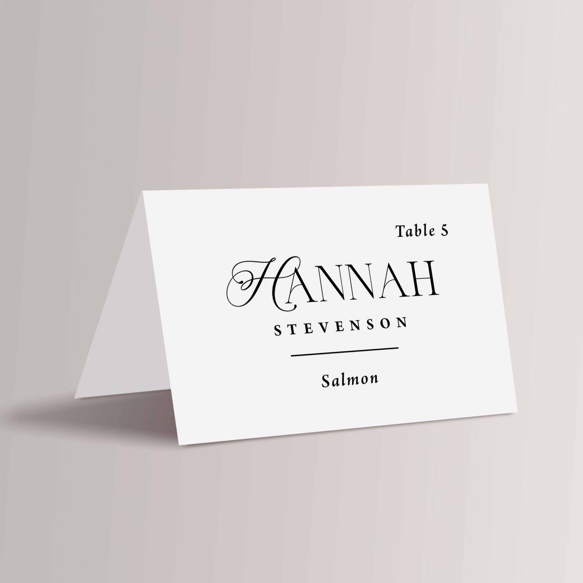 Place cards that are printed and personalized. These tented name cards can have the table numbers and meal choices. 