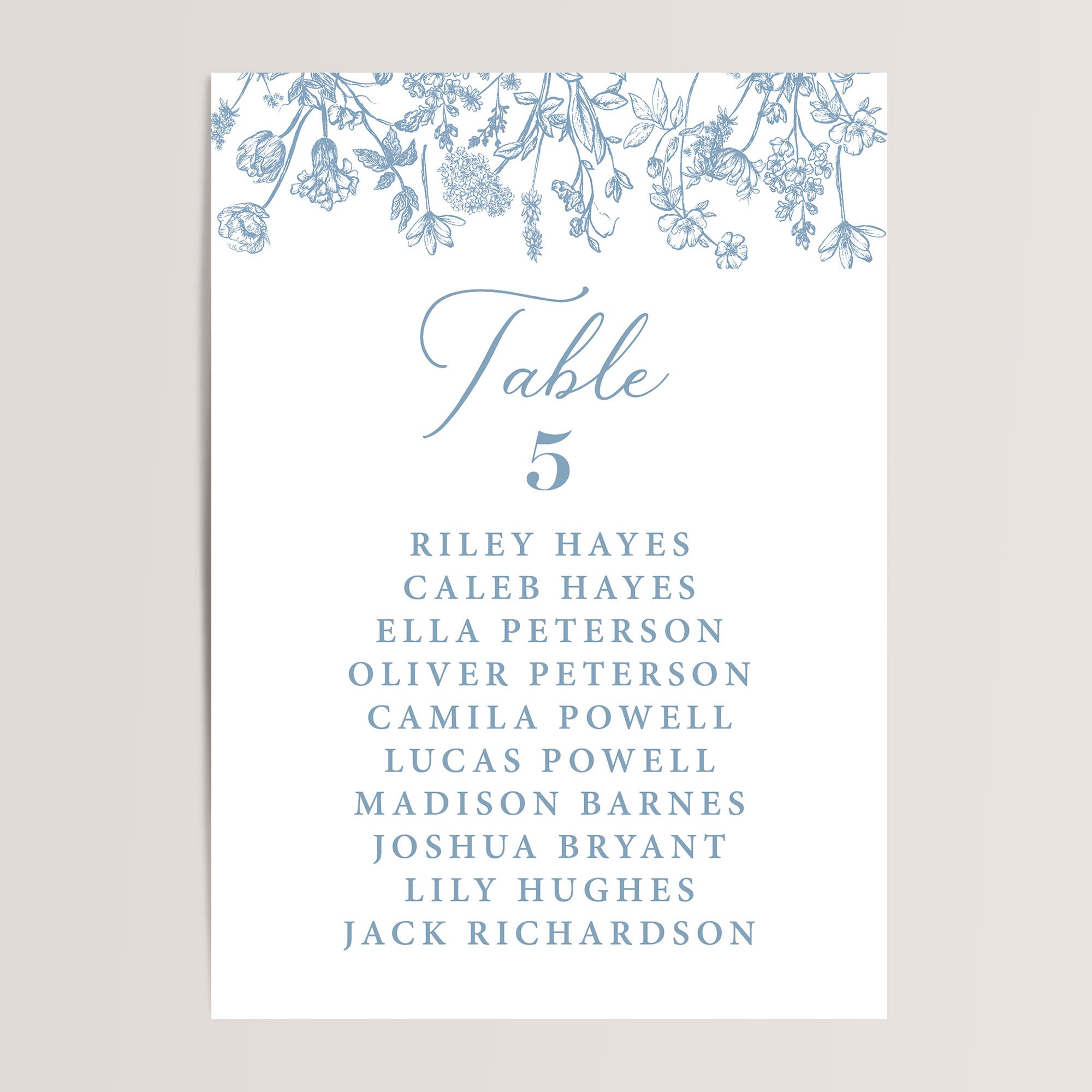 Simple wedding seating chart cards with dusty blue French toile florals that are printed for you on nice, thick card stock. These table seating arrangement signs are perfect wedding reception decor.
