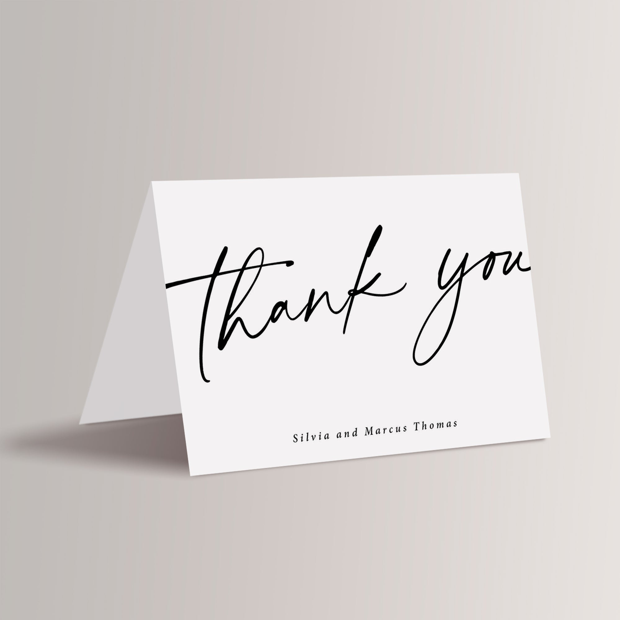 Simple Black and White Wedding Thank You Cards

Black and white minimalist wedding thank you cards – a timeless and elegant choice for your modern wedding. Featuring sleek, clean lines and a sophisticated design, these cards are a beautiful way to express your gratitude and complement your stylish wedding celebration. These are personalized with names.