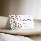 Bring a touch of natural beauty to your spring or summer wedding with our personalized wildflower place cards with meal choice. Featuring delicate floral illustrations and an elegant script font, these charming name cards perfectly complement a garden, outdoor, or rustic wedding. Not only do they guide your guests to their seats, but they also add a romantic, floral touch to your wedding reception décor.